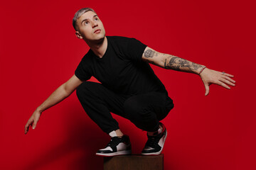 Young man in stylish sneakers