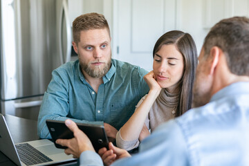 Financial Advisor Uses Tablet To Show Information