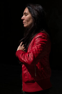 Mature Brunette In Red Leather Jacket