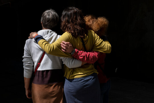 Back view of faceless women