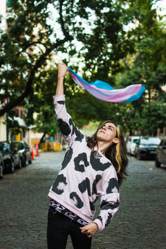 Trans teenage girl with pride flag 