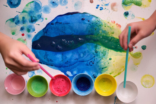 Closeup of the process of creating a watercolor painting