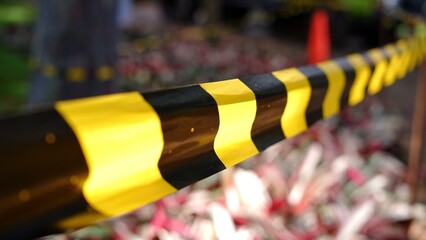Black yellow plastic barrier tape