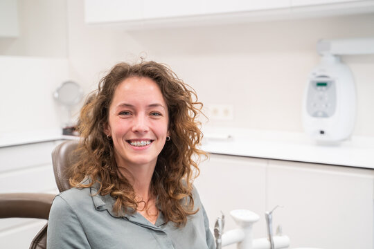 Patient With Clear Braces In Dental Clinic