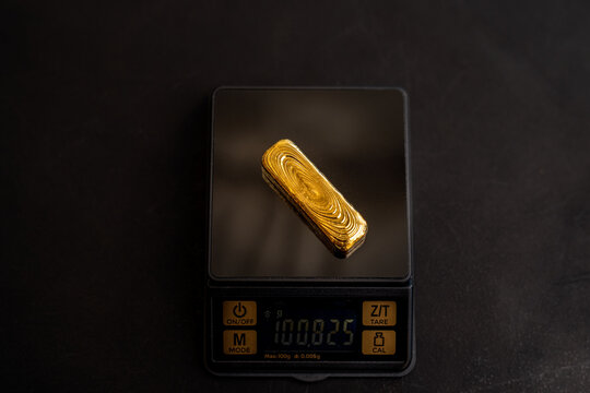 Gold Bullion on scales 