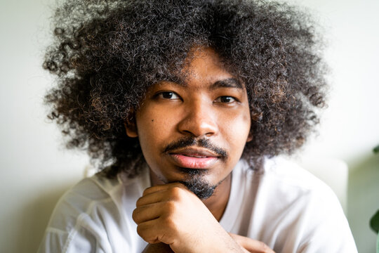 Young guy hangs out at home