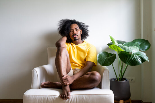 Young guy hangs out at home