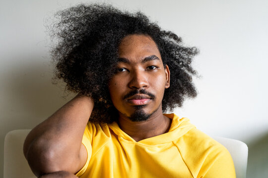 Young guy hangs out at home