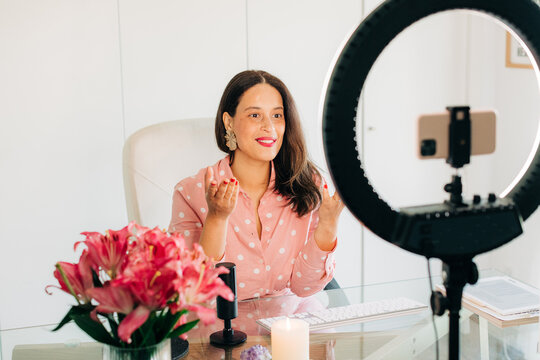 Woman recording video at the office