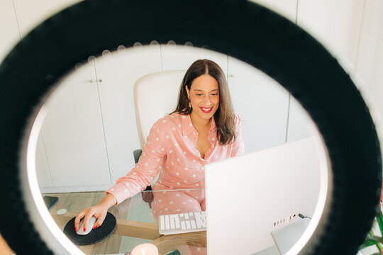 Woman having online meeting at the office