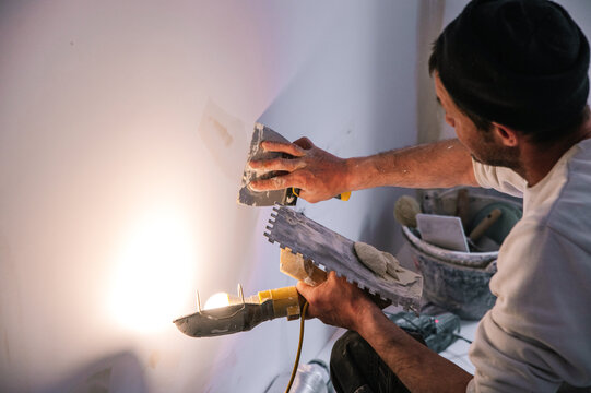 Interior designer fixing for painting wall