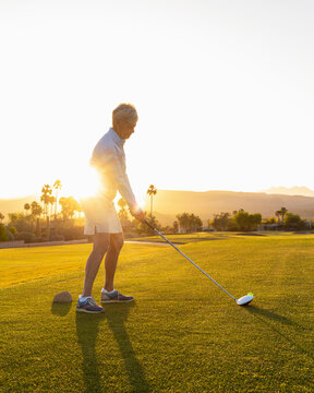 Driver club for  Senior Citizen Woman Playing Golf 