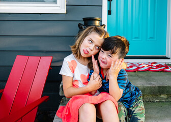 Siblings making silly faces