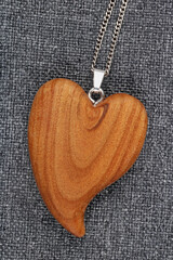 Simple homemade wooden heart pendant macro