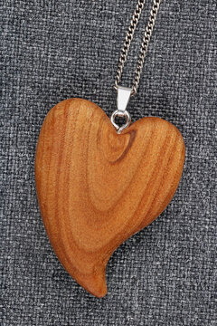 Simple homemade wooden heart pendant macro
