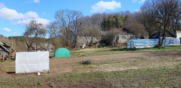 Spring in poor Lithuanian village landscape