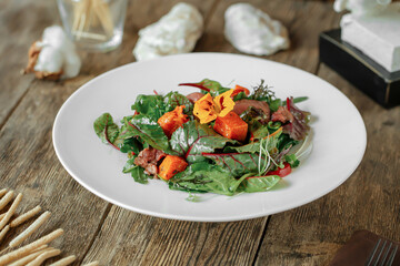 Closeup on portion of gourmet pumpkin salad