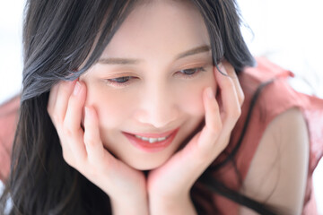 Close-up of a woman staring with a mocking expression