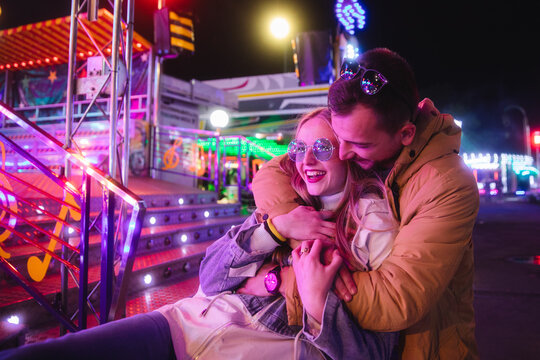 Couple having fun together at the funfair