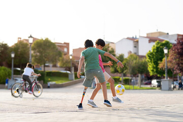 Happy kids playing soccer