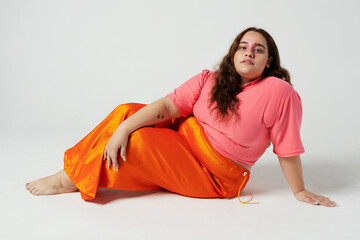 Full length portrait of young plus size woman