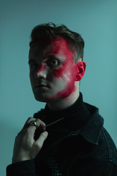 Young white man models in a studio