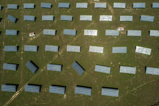 huge rotating solar panels on a solar farm