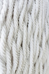 white beaded weaving texture close up