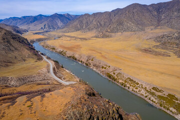 Drone aerial view Chuysky tract Altai Siberia Russia. Beautiful spring mountains