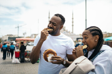Friends sharing chocolate buns