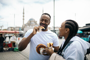 Friends sharing chocolate buns