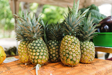 Pinneaple on a table at a farmers market