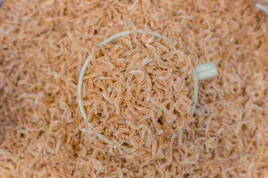 Dried krill, known locally as Alamang. For sale at a dried fish market.
