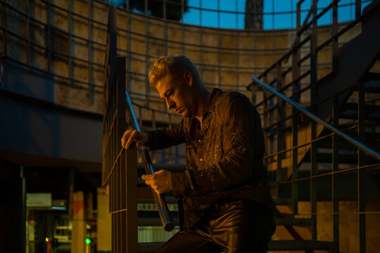 Lonely Man With Depression In A Dark Place At Night.