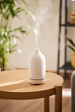 Essential oil diffuser on table