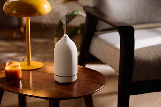 Essential oil diffuser near armchair
