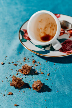 coffee remains and breadcrumbs