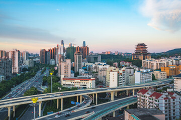 Naklejka premium The urban skyline of Nanning, Guangxi, green bamboo interchange and Yongzhou Pavilion in the evening