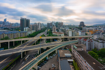 Fototapeta na wymiar The urban skyline of Nanning, Guangxi, green bamboo interchange and Yongzhou Pavilion at sunrise