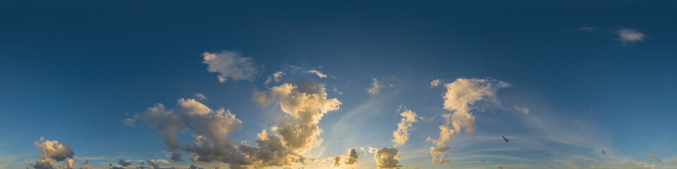 Dramatic sunset sky panorama with Cumulus clouds. Seamless hdr 360 pano in spherical equirectangular format. Complete zenith for 3D visualization, game and sky replacement for aerial drone panoramas