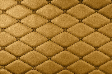 Brown leather texture. Part of perforated leather details. Orange perforated leather texture...