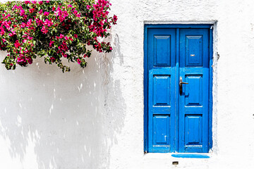Traditional greek style door in a town house on Santorini island