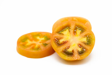 Fresh tomatoes slices isolated on white background.