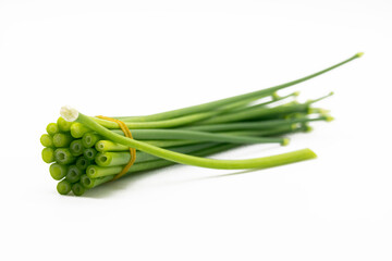 fresh chives close up isolated on white background..