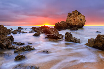 Fototapeta na wymiar The golden rocks of the Algarve, south of Portugal, Europe