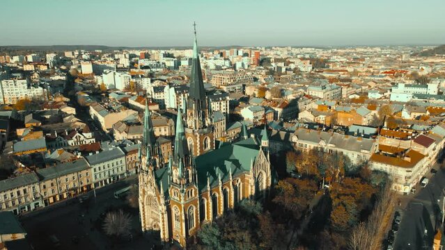 4k Aerial footage from flying drone over historical center of Church of St. Olga and Elizabeth old Catholic Cathedral in town Lviv, Ukraine. landmarks, architecture of ancient european city