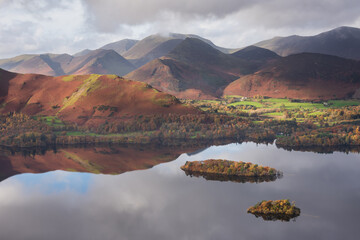 Beautiful landscape Autumn image of view from Walla Crag in Lake District, over Derwentwater...