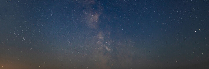 Starry night sky with milky way galaxy breathtaking view © H_Ko
