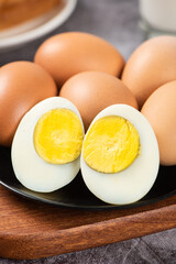 slice of peeled boiled eggs on table