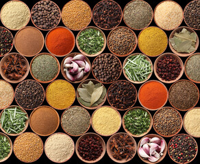Collection of different aromatic spices and herbs on black background, flat lay